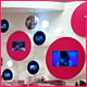 Eye catching social housing exhibition stand utilising low cost LCD screens and digital photo frames.